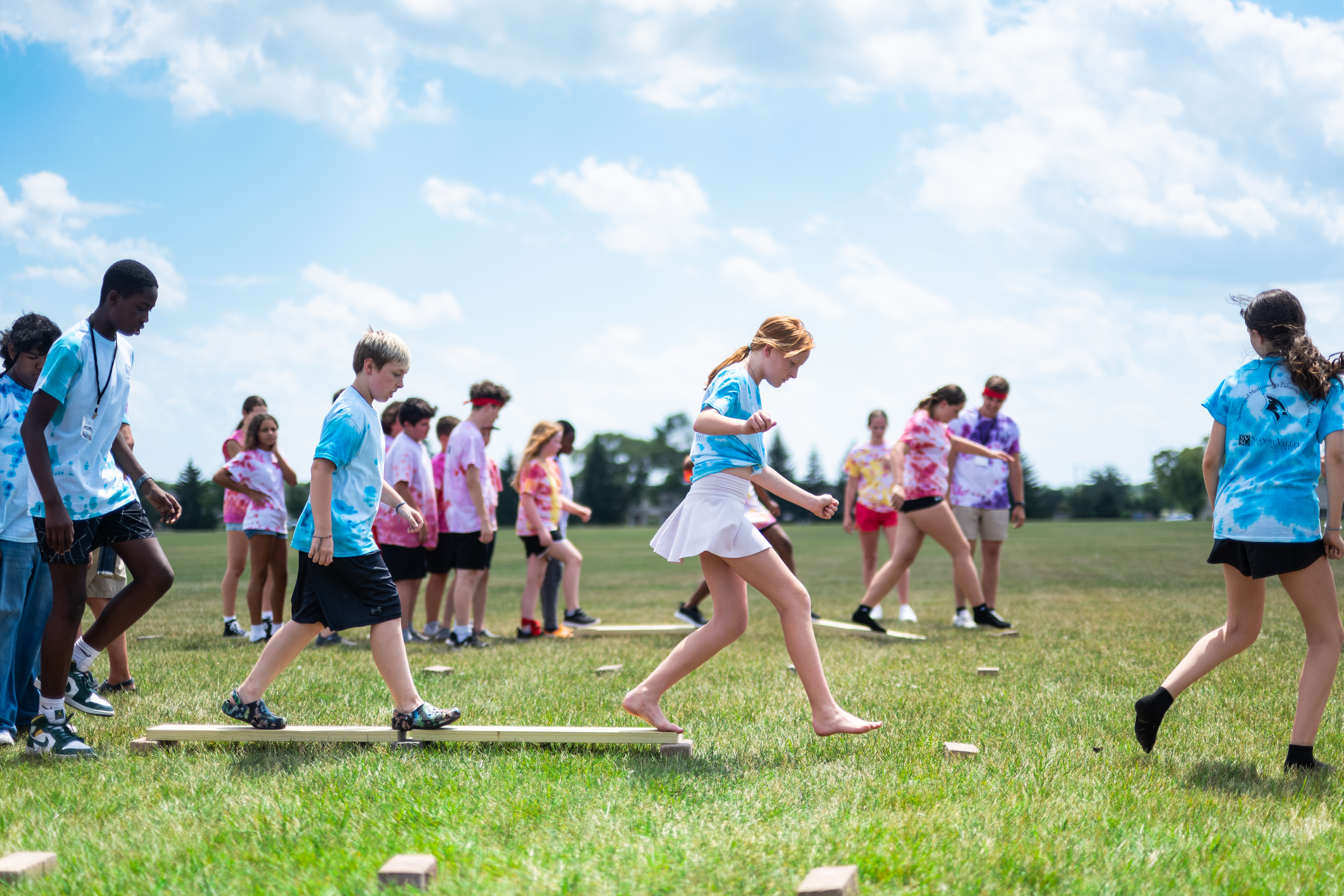 Students doing a Survivor challenge.